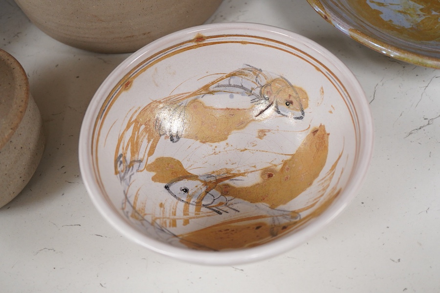 An Andrew Hill charger, 44cm diameter, two Mohammed Hamid (Lewes) bowls and two unsigned Bernard Leach pottery jars and covers